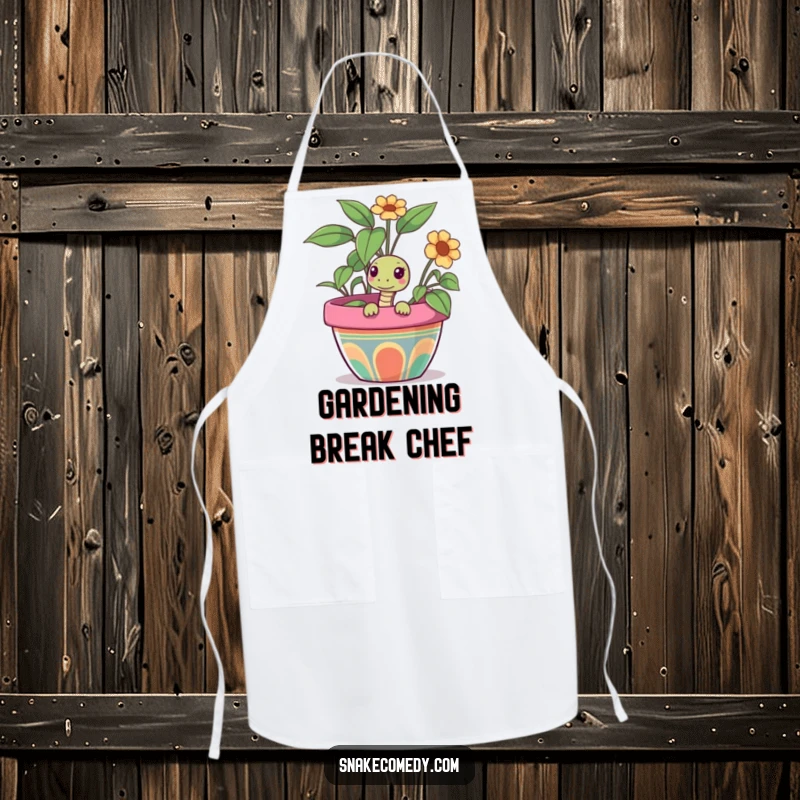 Funny snake apron with a curious snake peeking out from a colorful flower pot, perfect for adding garden humor to kitchen tasks.