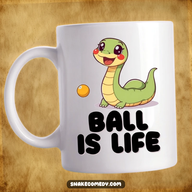 Funny Snake Ball Mug: An excited snake with a wiggly body is enthusiastically chasing a bright, bouncing toy ball.