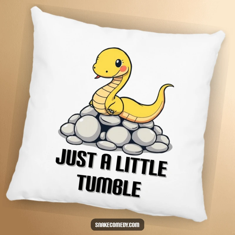 Funny snake pillow featuring a cartoon snake comically slipping on smooth round stones, providing soft, humorous comfort.