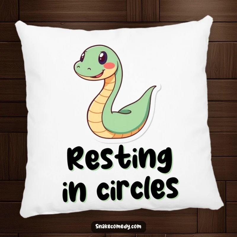 Funny snake pillow featuring a happy snake coiled in a spiral with a wide grin, offering a soft and amusing accent.