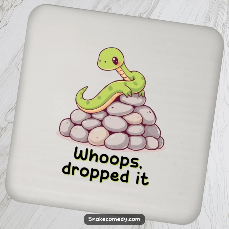 Funny drink coaster with a cartoon snake comically slipping on a pile of smooth, round stones, protecting surfaces with humor.