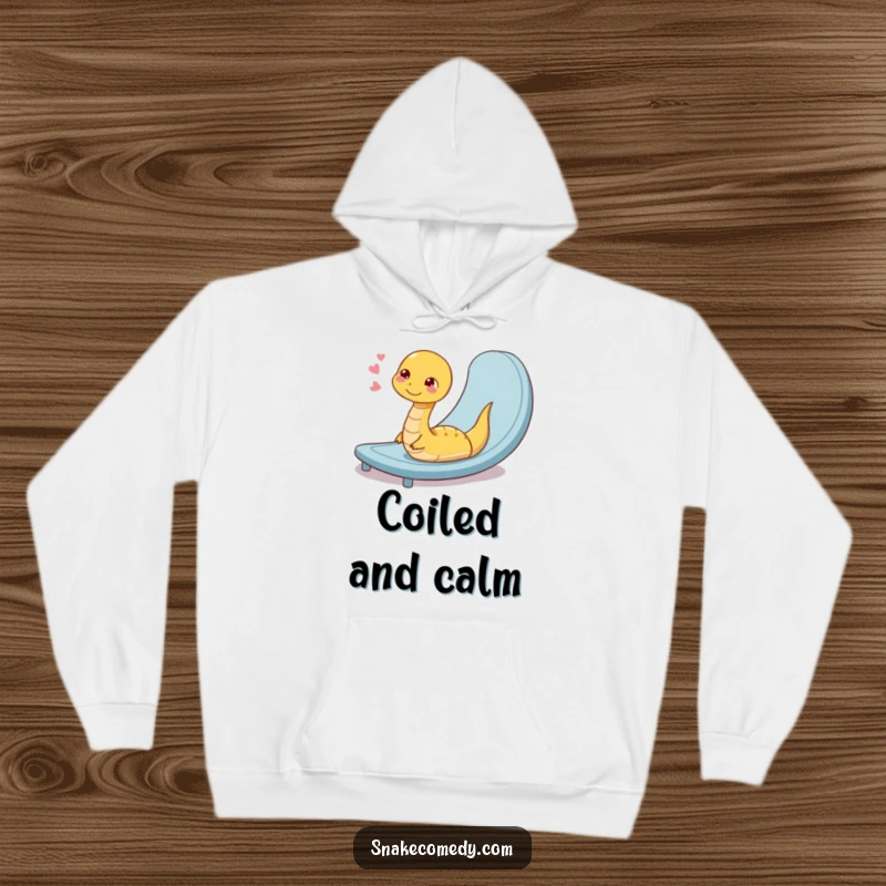 Funny hoodie with a coiled snake character sighing contentedly after a smooth slide down a ramp, offering warmth and humor.