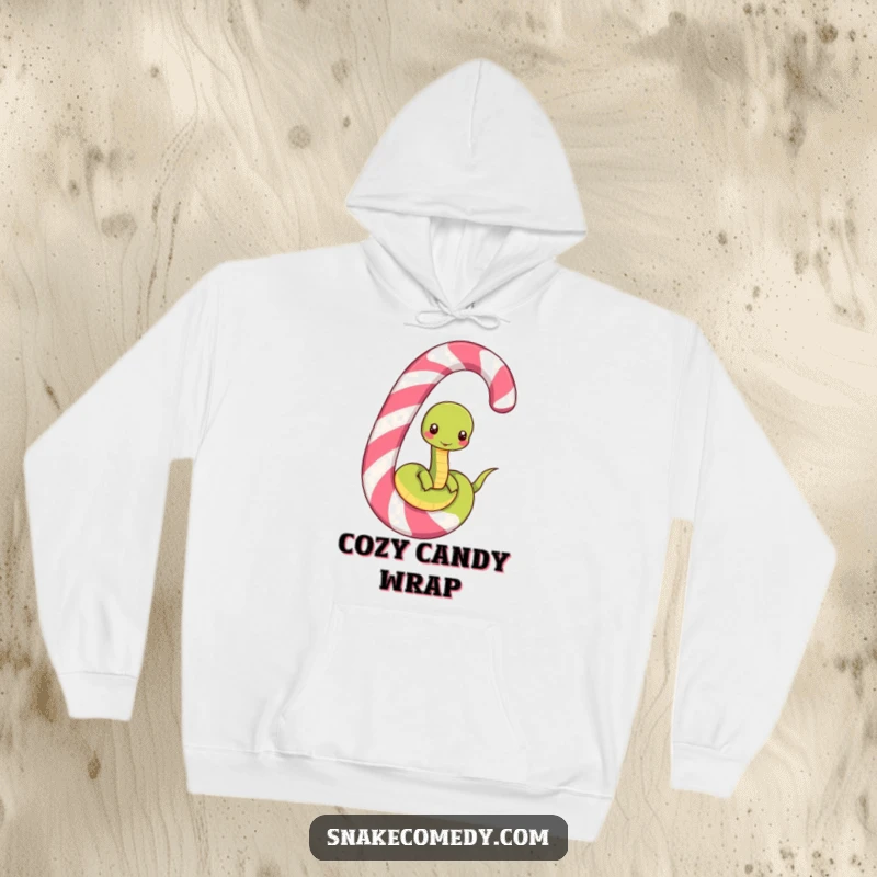 Funny hoodie depicting a joyful snake character unwinding from a massive, colorful striped candy cane, radiating festive comfort and amusement.