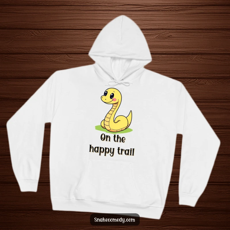Funny snake joyfully slithering on a colorful path, featured on a soft, warm, and humorous hoodie.