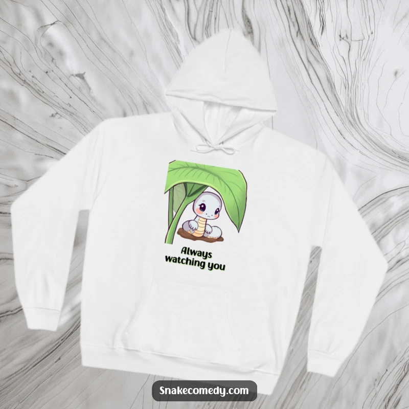 Funny Curious Snake Hoodie: serpent peeking from a large green leaf, showcasing curiosity, a warm gift.