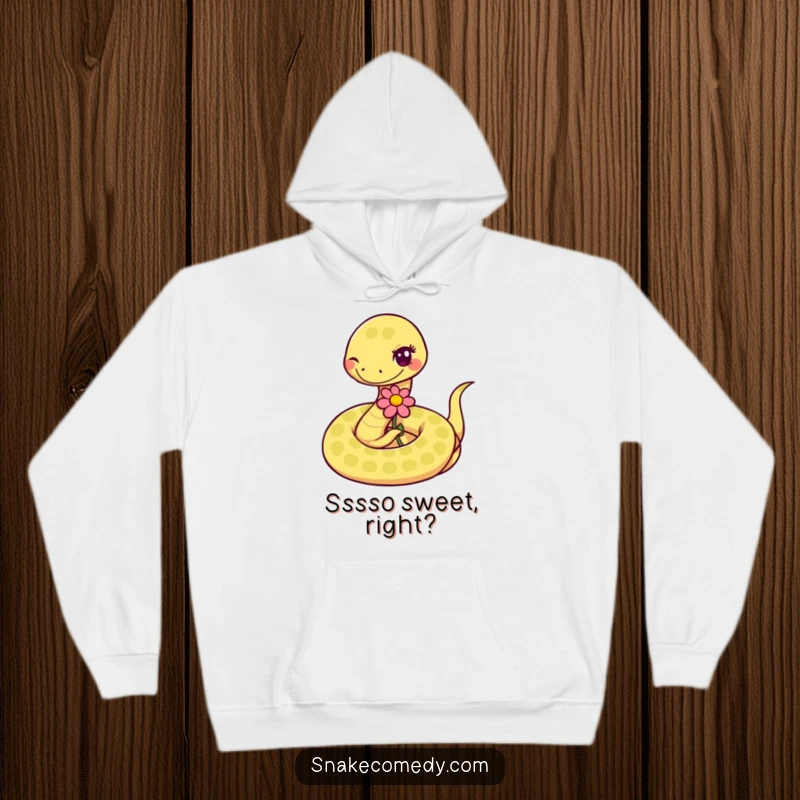 Funny coiled snake winking while extending a flower on a hoodie, a heartwarming and humorous depiction.
