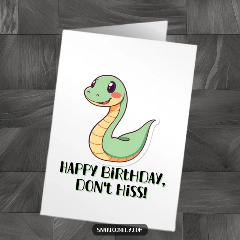 Funny Free Printable Birthday Card: A happy snake playfully slithers in a tight spiral with a wide grin. Downloadable fun.