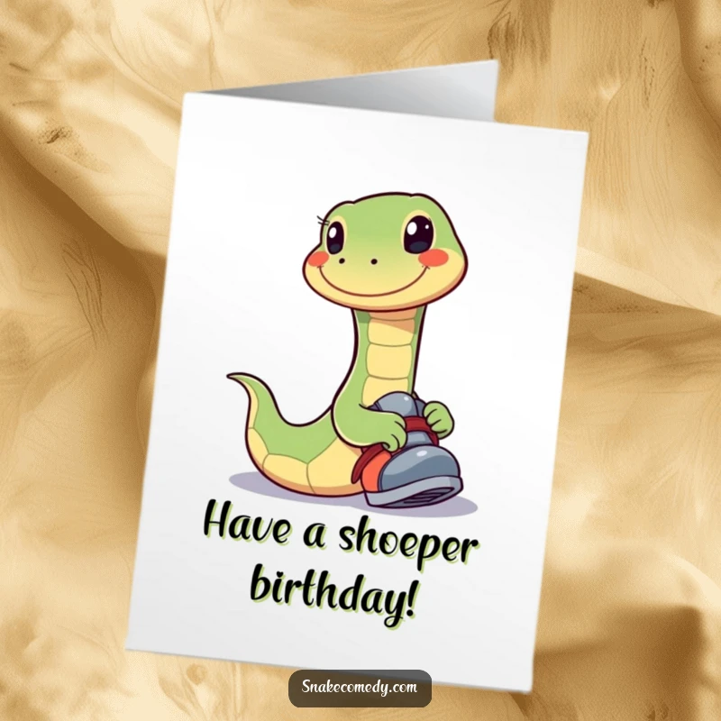 Funny Free Printable Birthday Card: A snake with a huge smile playfully tries on a shoe.