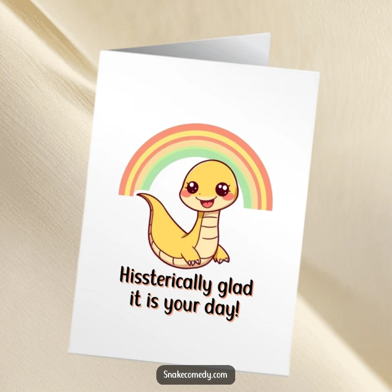 Funny Free Printable Birthday Card: Grinning snake slithering down a bright rainbow, a joyful and downloadable greeting.
