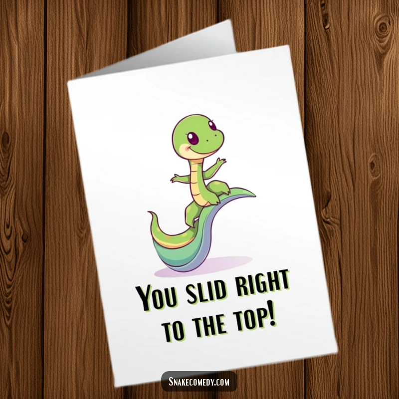 Funny Free Printable Congrats Card: A giddy snake masterfully balances while navigating a fun, winding slide with joyful abandon.