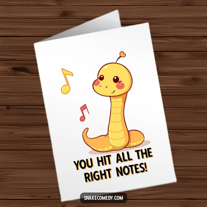 Funny Free Printable Congratulations Card: A snake playfully hits a floating musical note with joy.