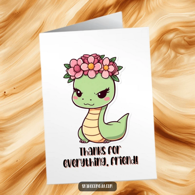 Funny Free Printable thank you card featuring a cute snake with a flower crown, offering a sly, thankful wink.