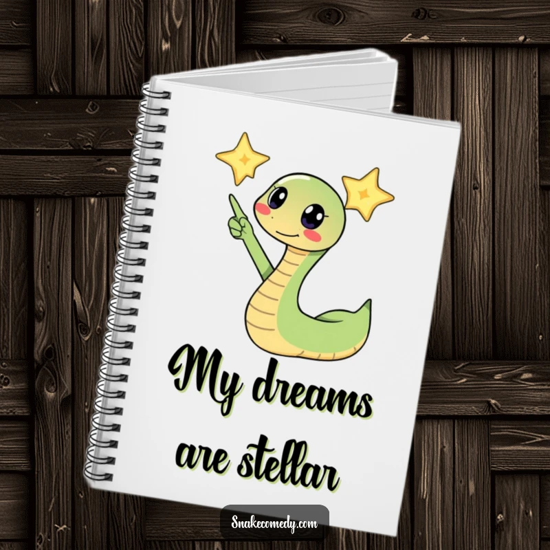 Funny snake excitedly pointing its head towards a twinkling star on a notebook, perfect for journaling aspirations and cosmic thoughts.