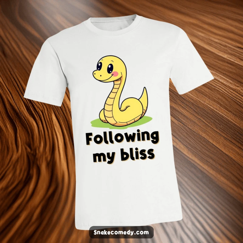 Funny snake character joyfully slithering along a winding, colorful path on a humorous and energetic t-shirt.