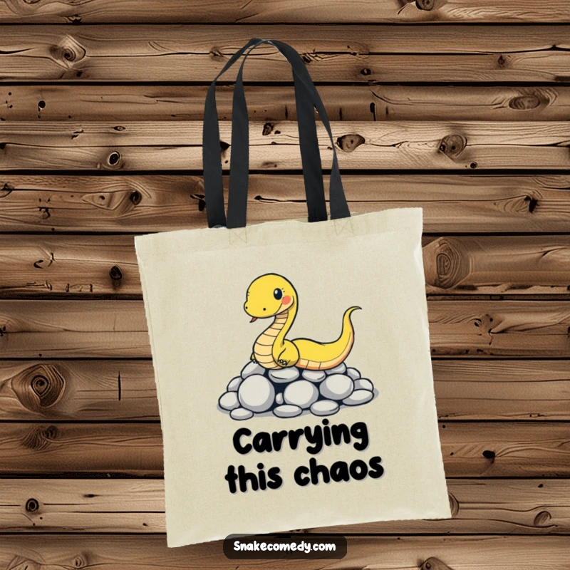 Funny snake tote bag depicting a cartoon snake comically slipping on smooth round stones, a humorous and practical accessory.